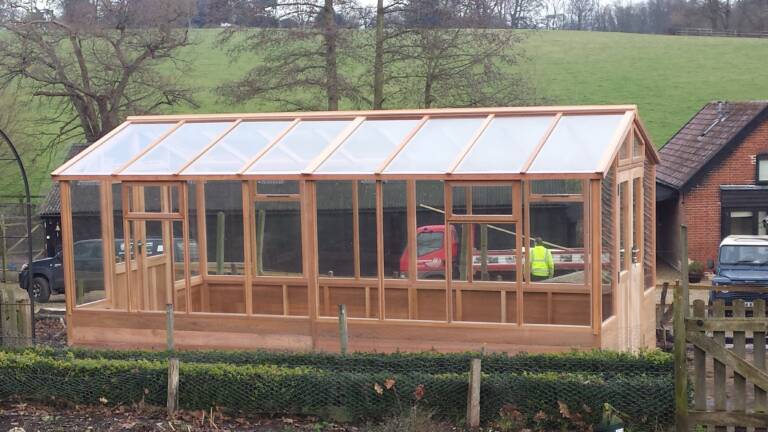 Cedar Greenhouse designed, built and installed by Hutchinsons in Essex